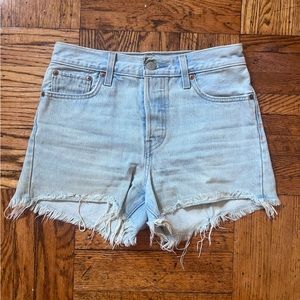 Light wash wedgie fit Levi cut-off denim shorts